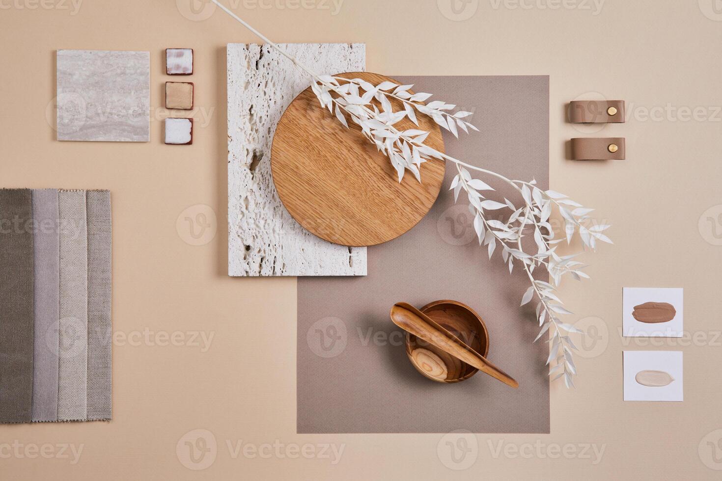 Creative flat lay composition with textile and paint samples, panels and cement tiles. Stylish interior designer moodboard. Light beige color palette. Copy space. Template. photo