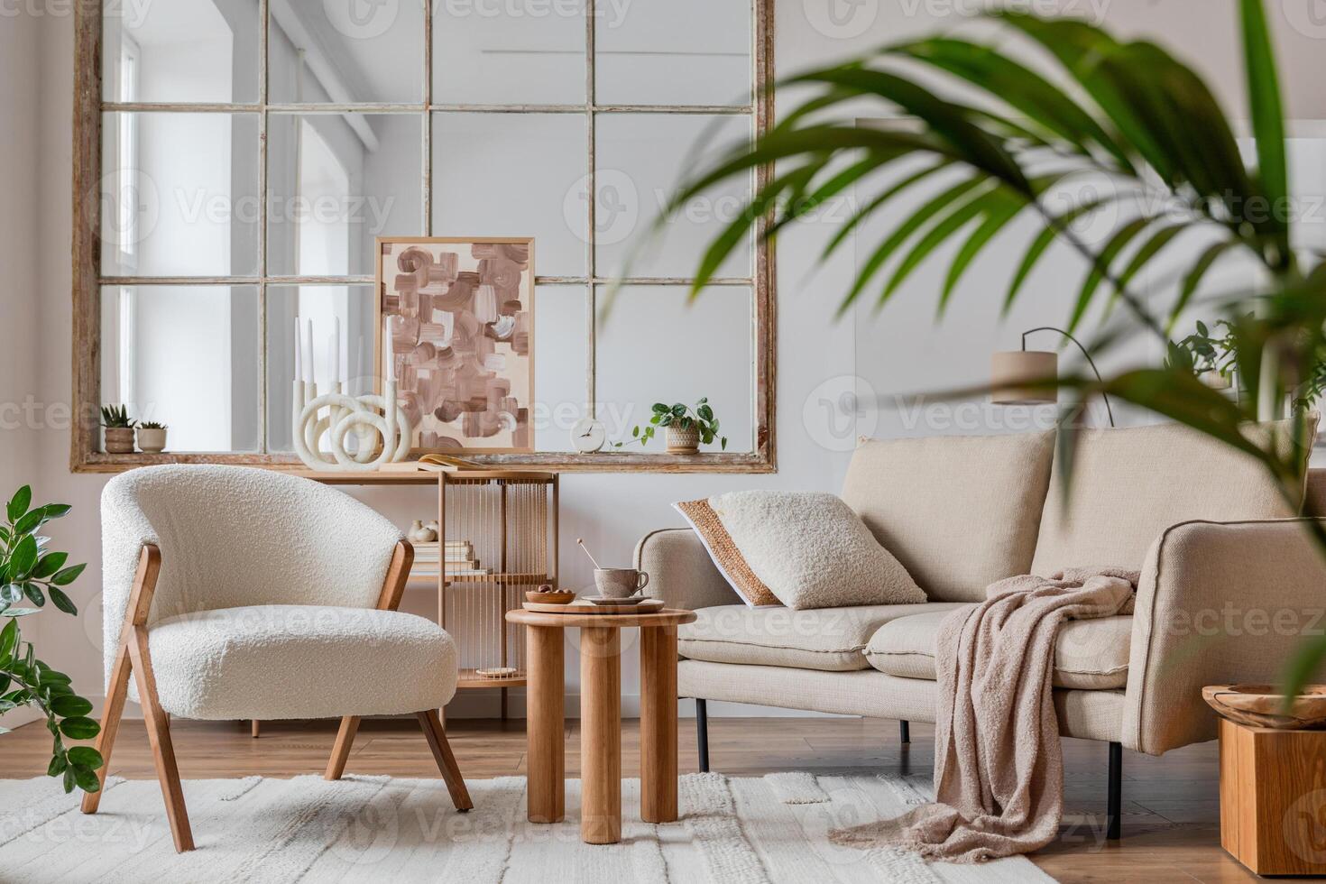 Stylish compositon of modern living room interior with frotte armchair, sofa, plants, painting, wooden commode, side table and elegant home accessories. Template. Copy space. photo