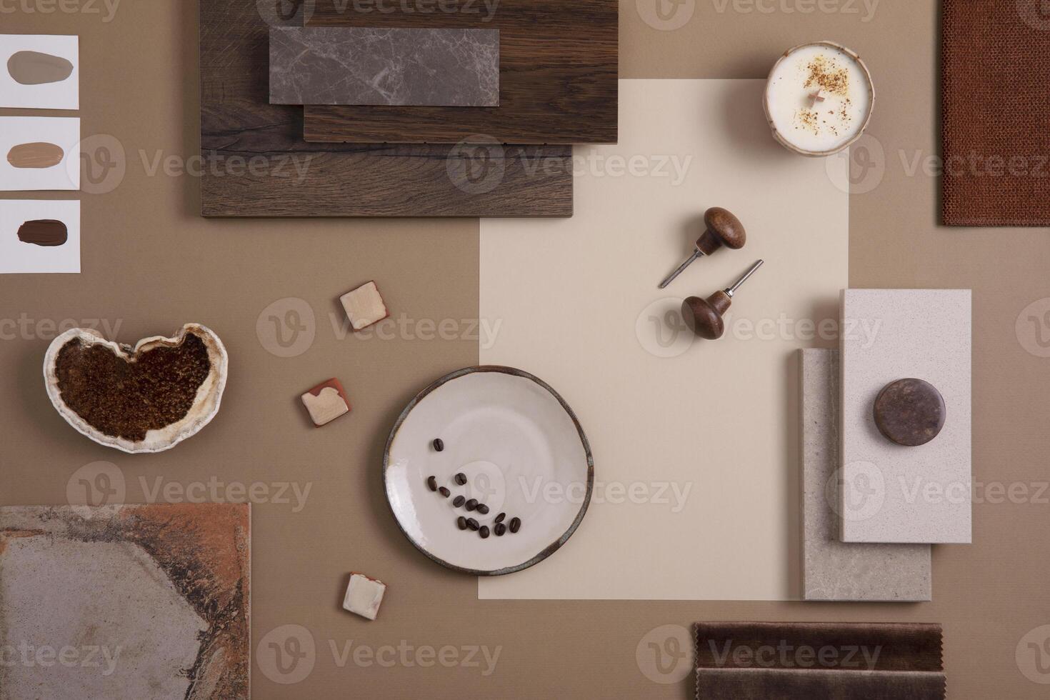 Flat lay of creative architect moodboard composition with samples of textile, paint, panels and tiles. Natural materials. Beige and brown color palette. Top view. Copy space. Template. photo