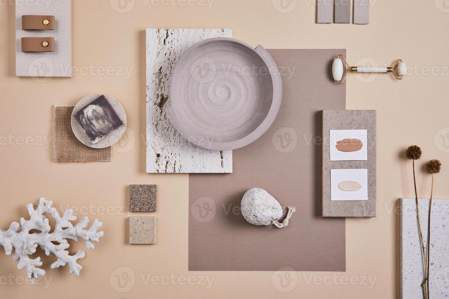 Creative interior designer moodboard. Flat lay composition with textile and paint samples, panels and cement tiles. Beige and grey color palette. Copy space. Template. photo