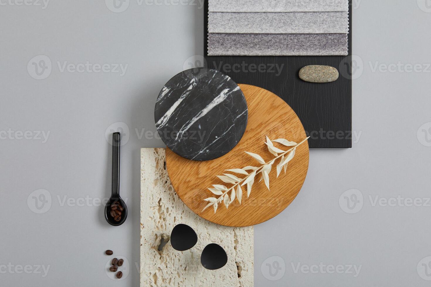 Elegant architect moodboard flat lay composition in light grey, black and brown color palette with textile and paint samples, wooden panels and marble tile. Top view. Copy space. Template. photo