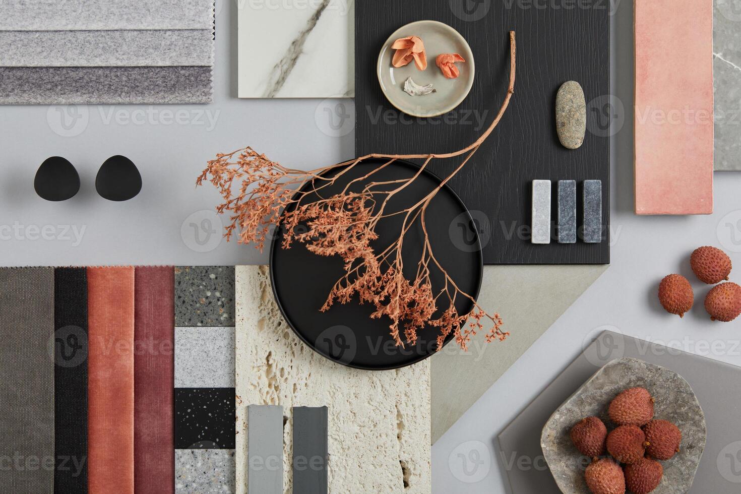 Creative flat lay composition with textile and paint samples, panels and tiles. Stylish interior designer moodboard. Pink, black and light grey color palette. Copy space. Template. photo