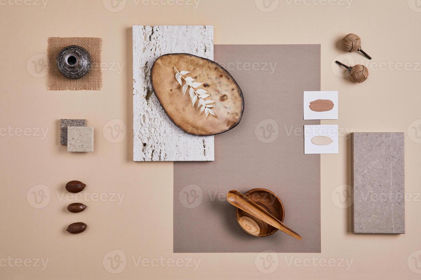 Creative flat lay composition with textile and paint samples, panels and cement tiles. Stylish interior designer moodboard. Light beige color palette. Copy space. Template. photo