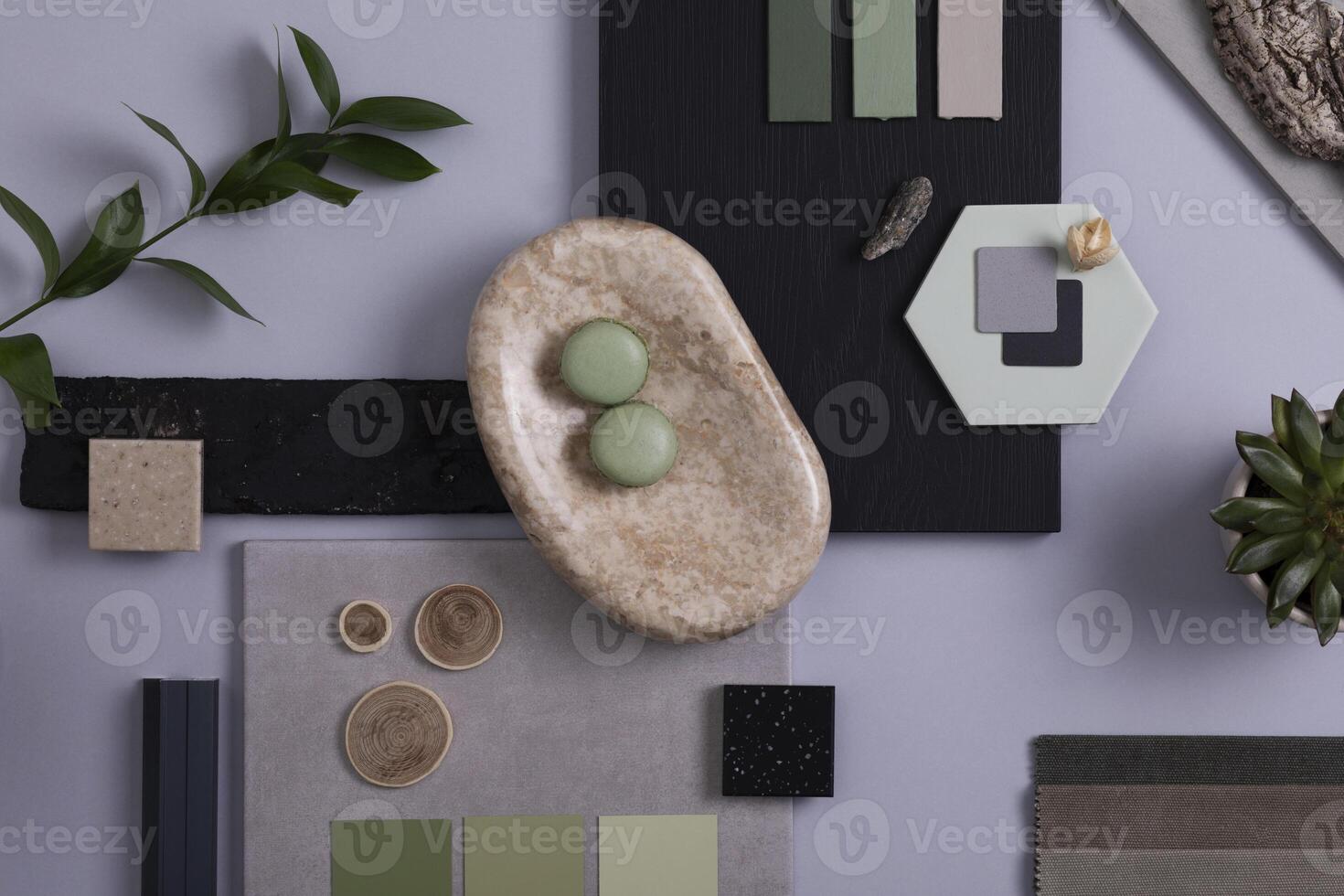 Creative architect and interior designer moodboard. Flat lay composition in grey and green color palette with textile and paint samples, panels and tiles. Top view. Copy space. Template. photo