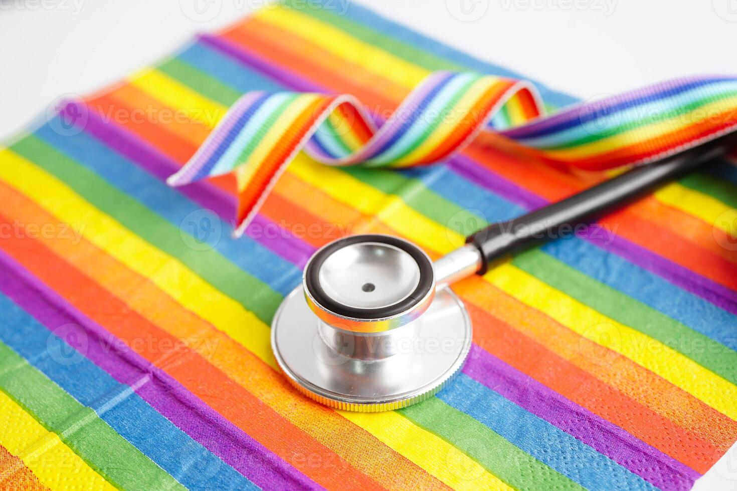 LGBT symbol, Stethoscope on rainbow flag, rights and gender equality, LGBT Pride Month in June. photo