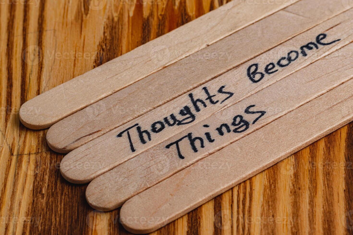 Positive thoughts for increasing selfesteem on wooden posts on wooden background photo