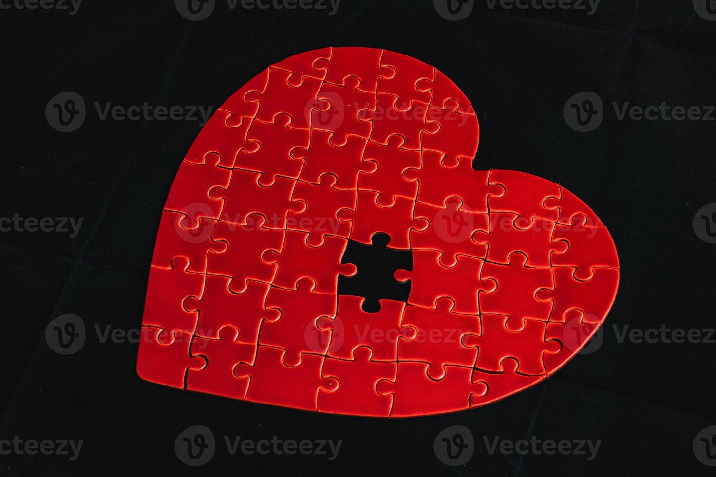 Concept of unrequited feelings, heart puzzle with missing element photo