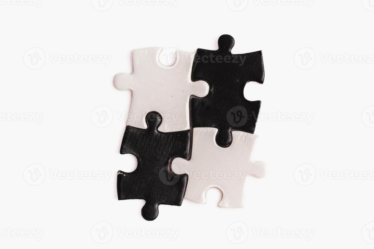 A puzzle piece with and black, sense of incompleteness and mystery photo