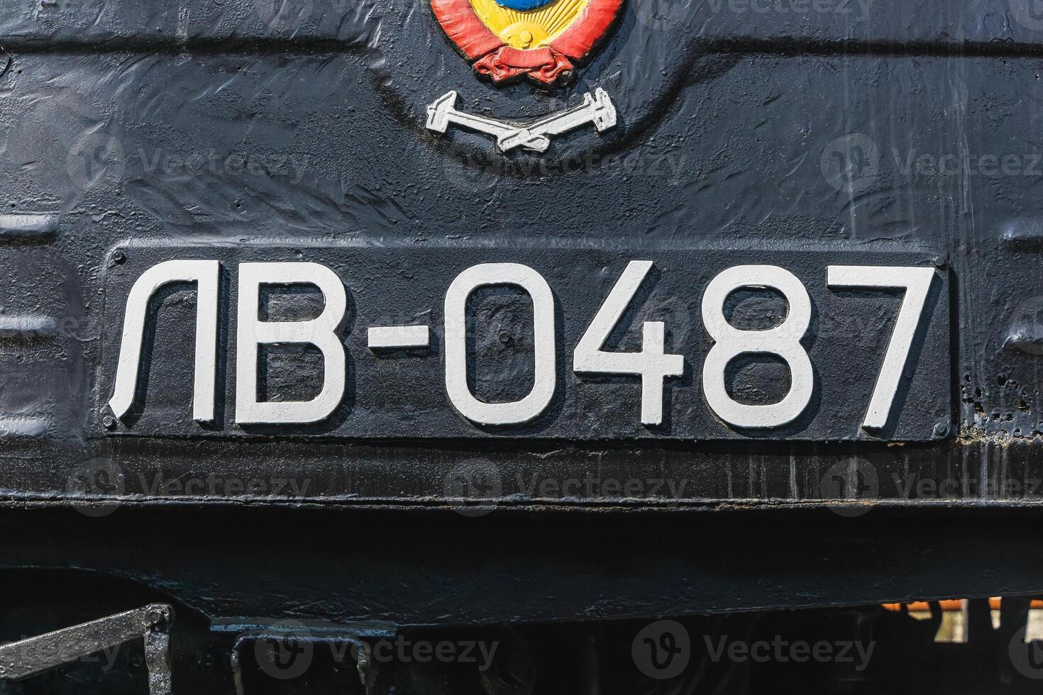 Text and numbers on a metal surface with the symbols of the USSR for design and commercial use photo