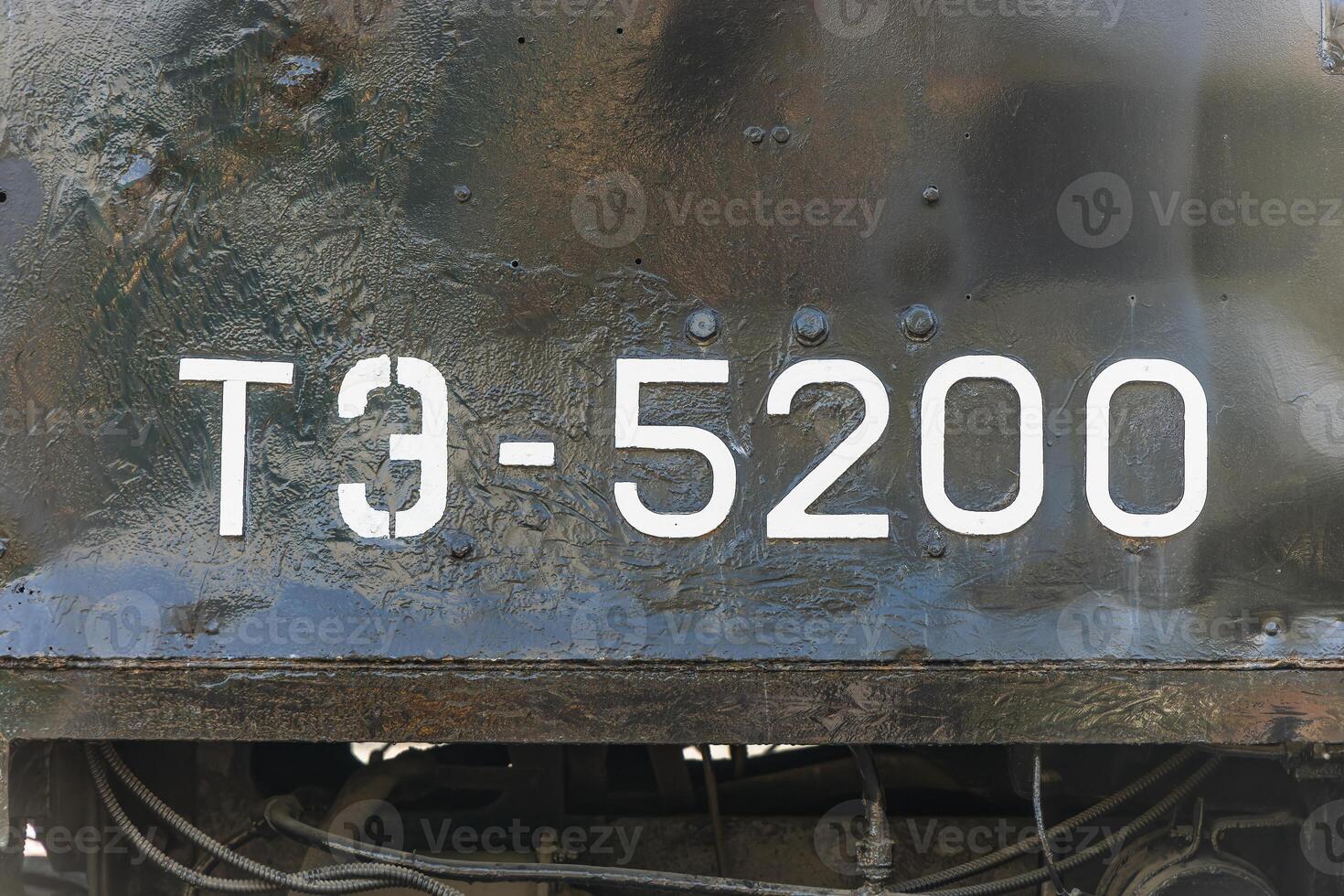 Text and numbers on a metal surface with the symbols of the USSR for design and commercial use photo