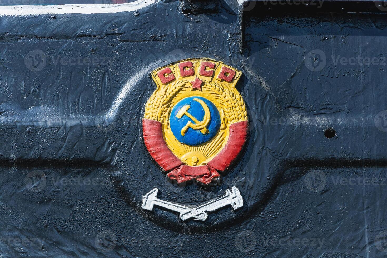 Text and numbers on a metal surface with the symbols of the USSR for design and commercial use photo