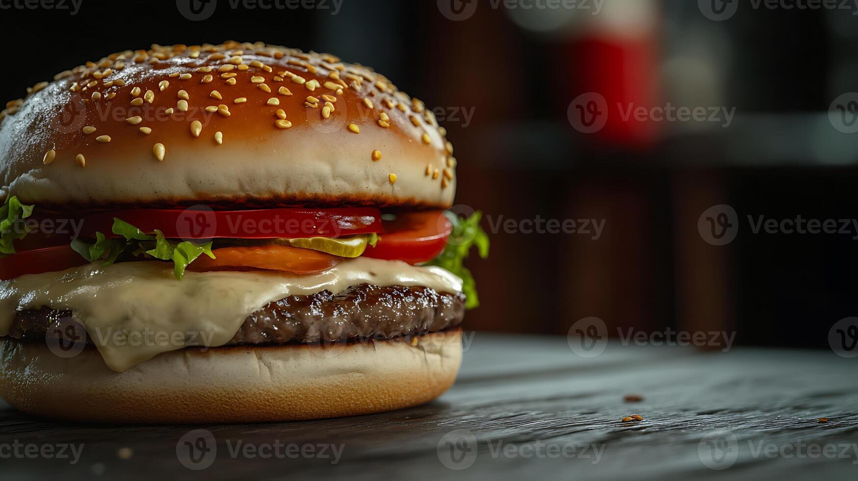 Enjoy a Tasty Burger with Tomatoes, Onions, and Lettuce photo
