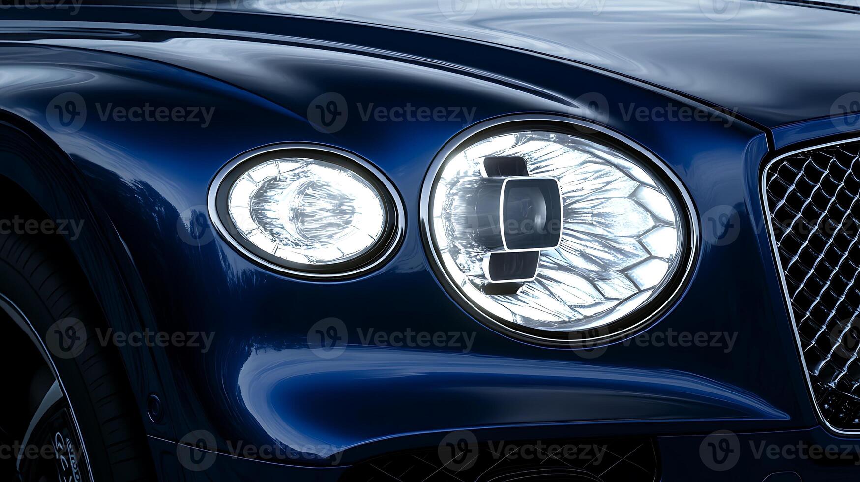 Luxury car headlight and front light close-up with copy space photo