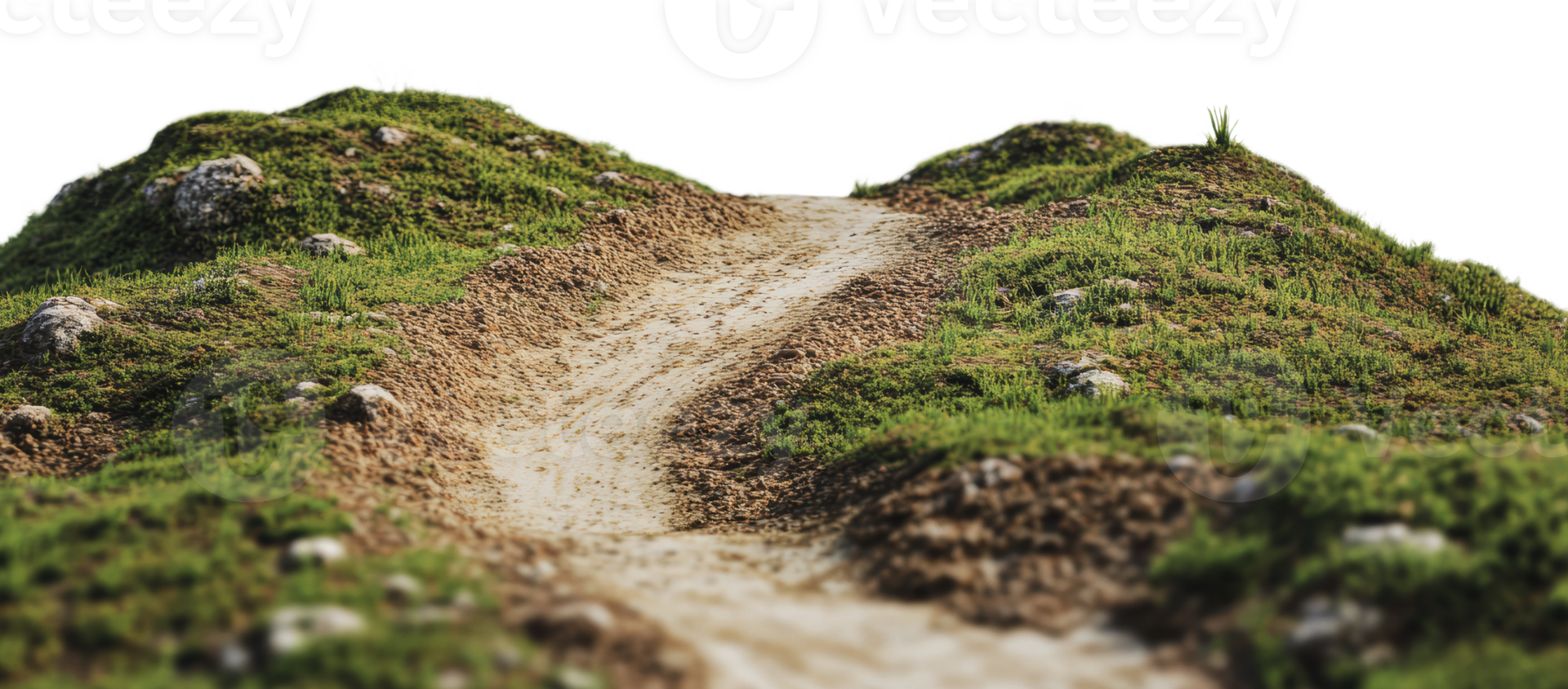 Winding dirt path through green hills at sunrise png