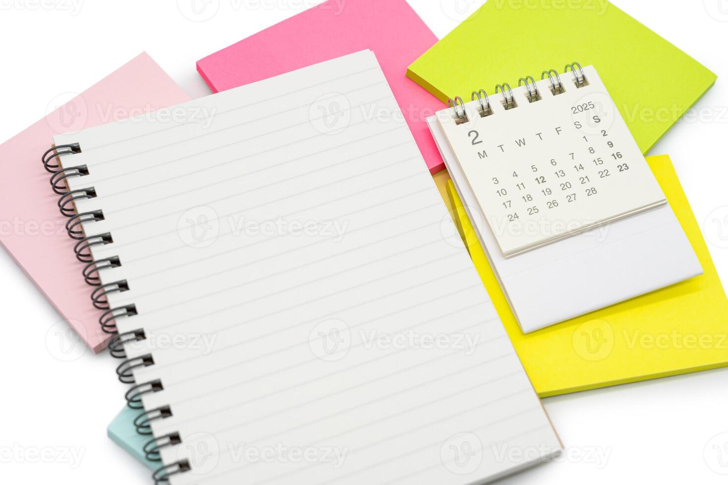 Simple desk calendar for FEBRUARY 2025 with office supplies. Calendar concept with copy space. 2025 FEB calendar. photo