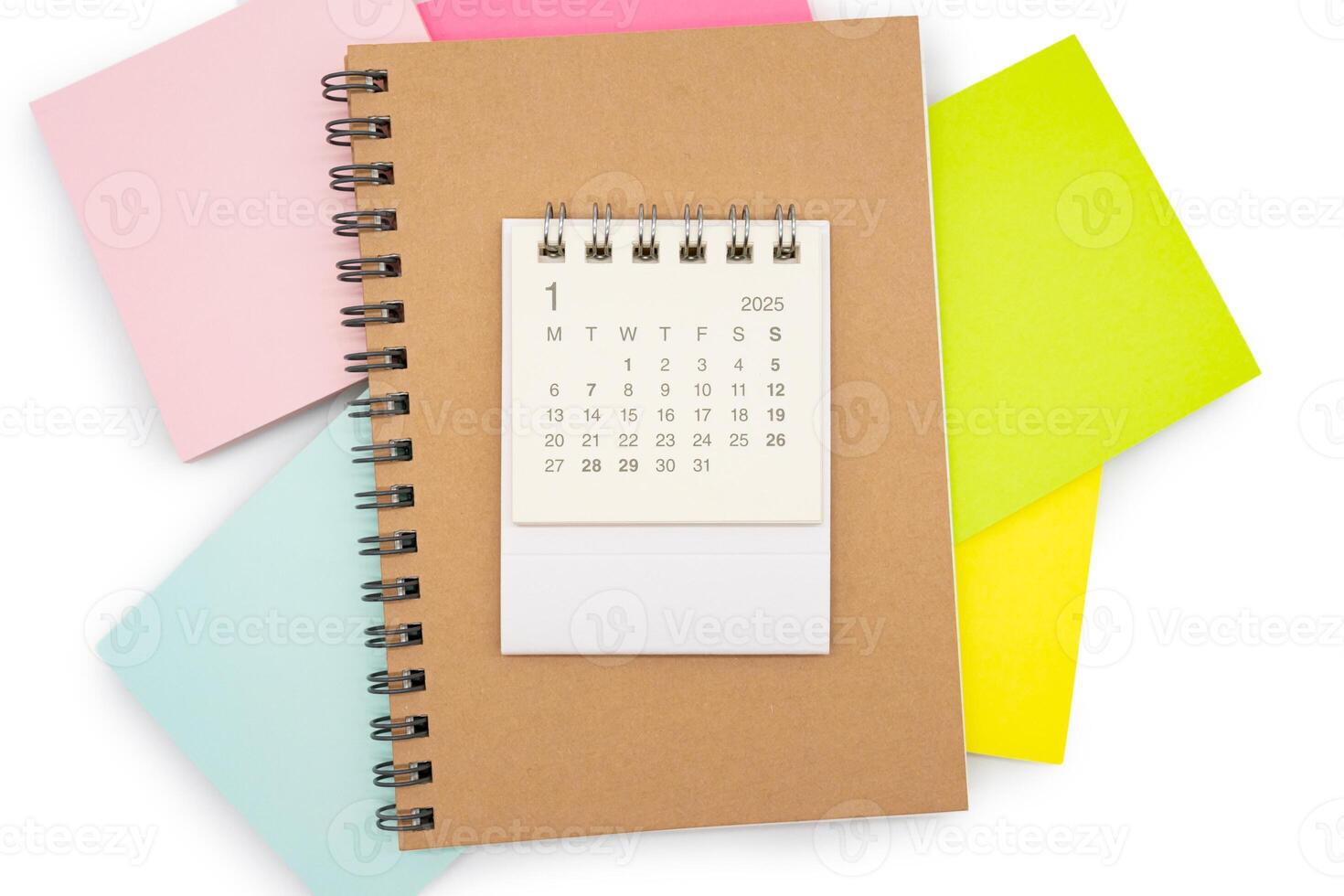 Simple desk calendar for JANUARY 2025 with office supplies. Calendar concept with copy space. 2025 JAN calendar. photo