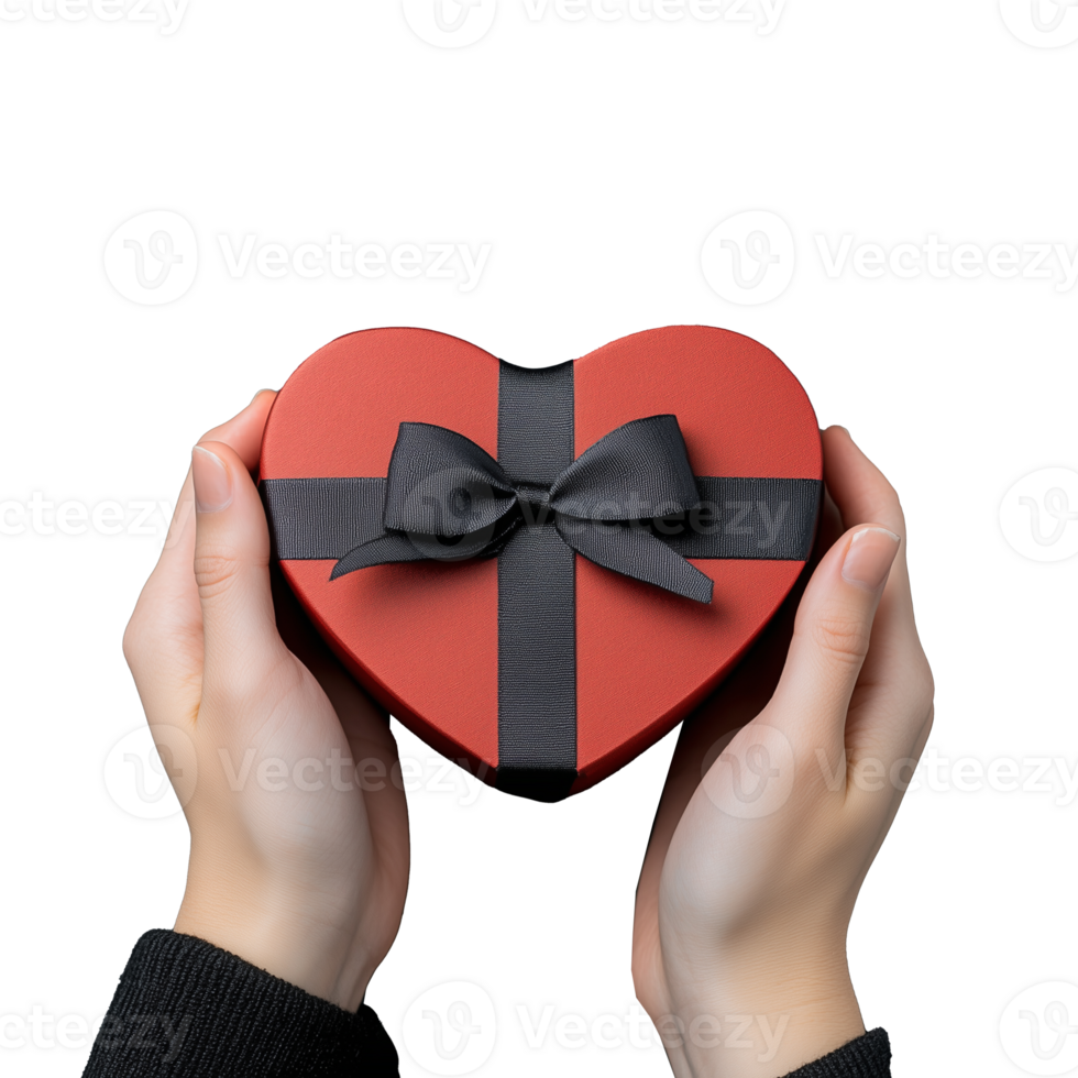 Heart-shaped gift box held in hands with transparent background png