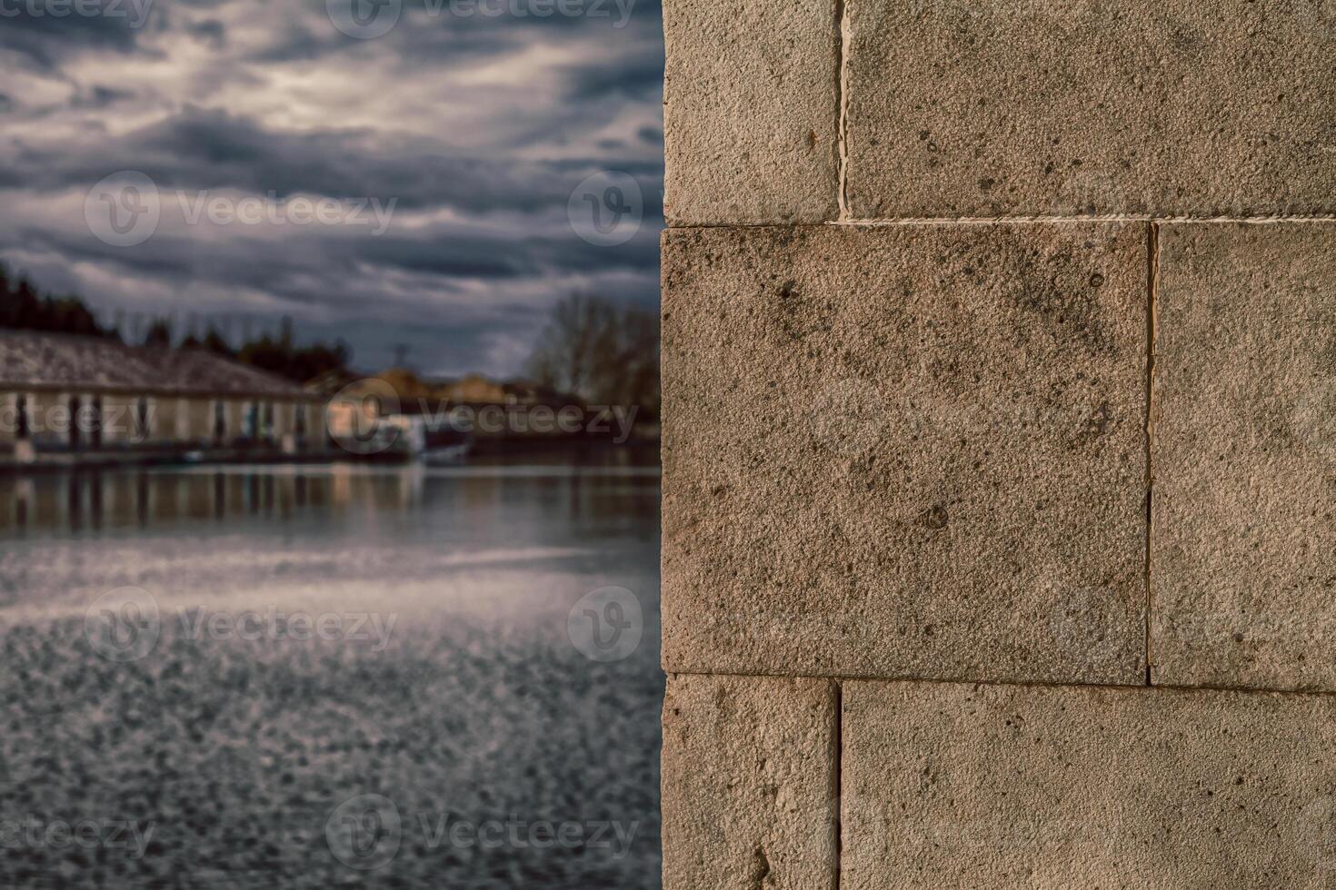 Riverside in autumn with Textured Stone in HDR photo technique