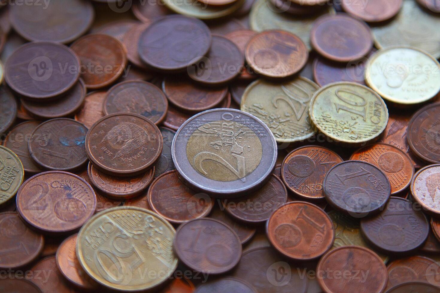 Background texture of a Close-Up of Euro Coins in Various Denominations photo