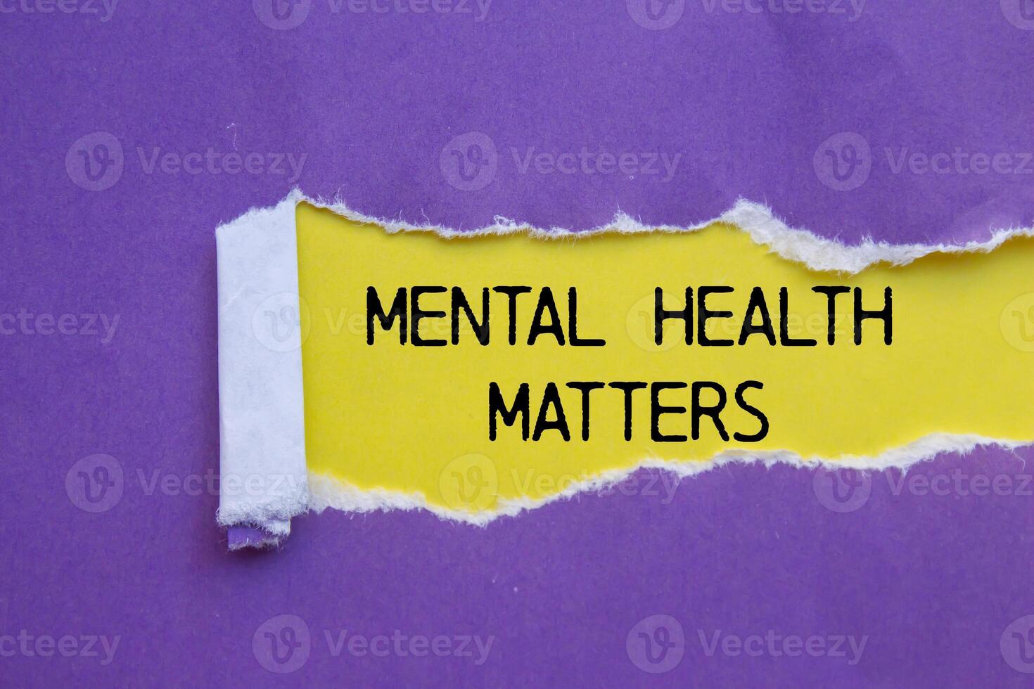 Mental health matters message written on ripped torn purple paper with yellow background. Conceptual mental health matters symbol. Copy space. photo