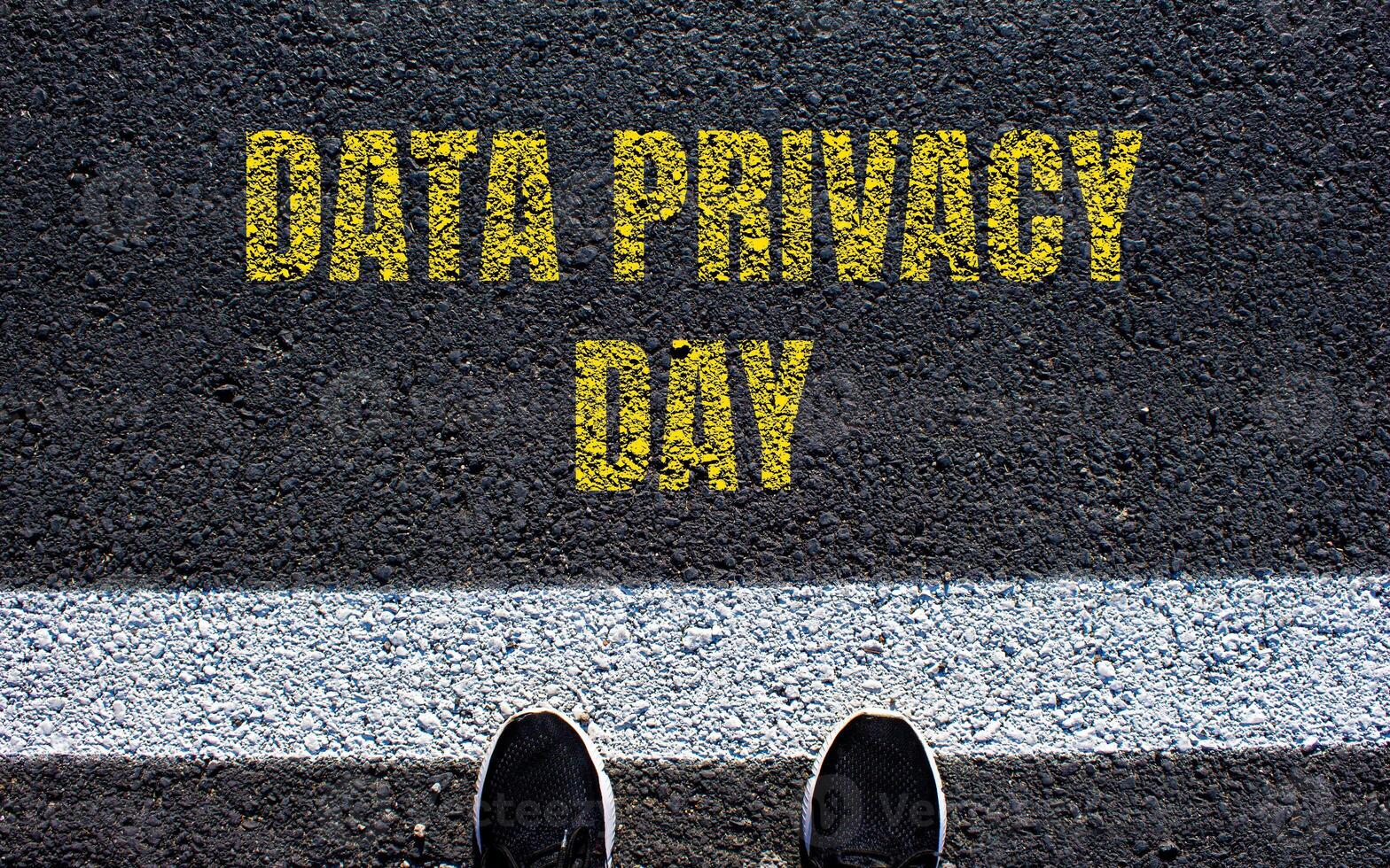 Data privacy day message written on asphalt road. Conceptual data privacy day symbol. Copy space. photo