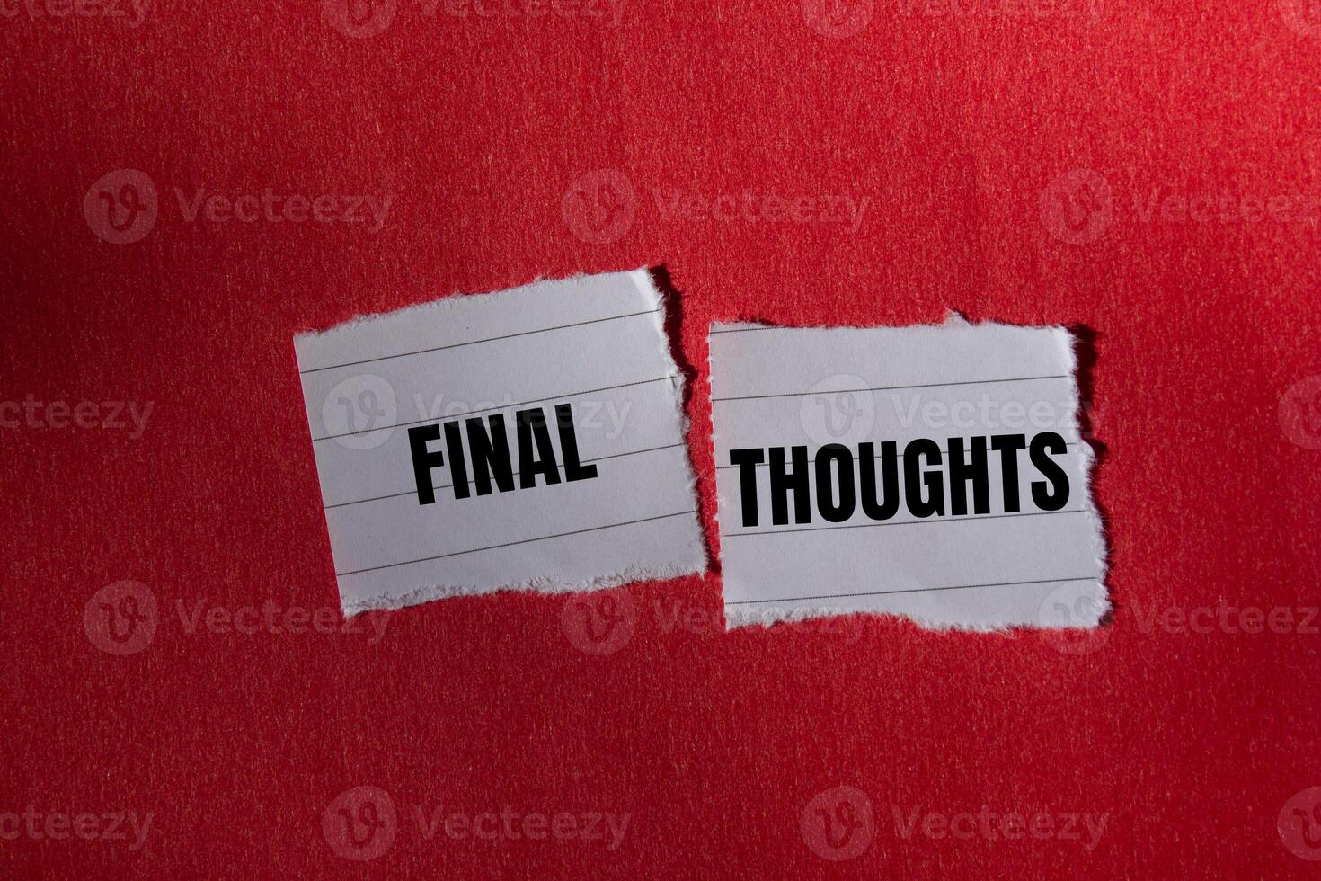 Final thoughts message written on ripped torn paper piece with red background. Conceptual final thoughts symbol. Copy space. photo