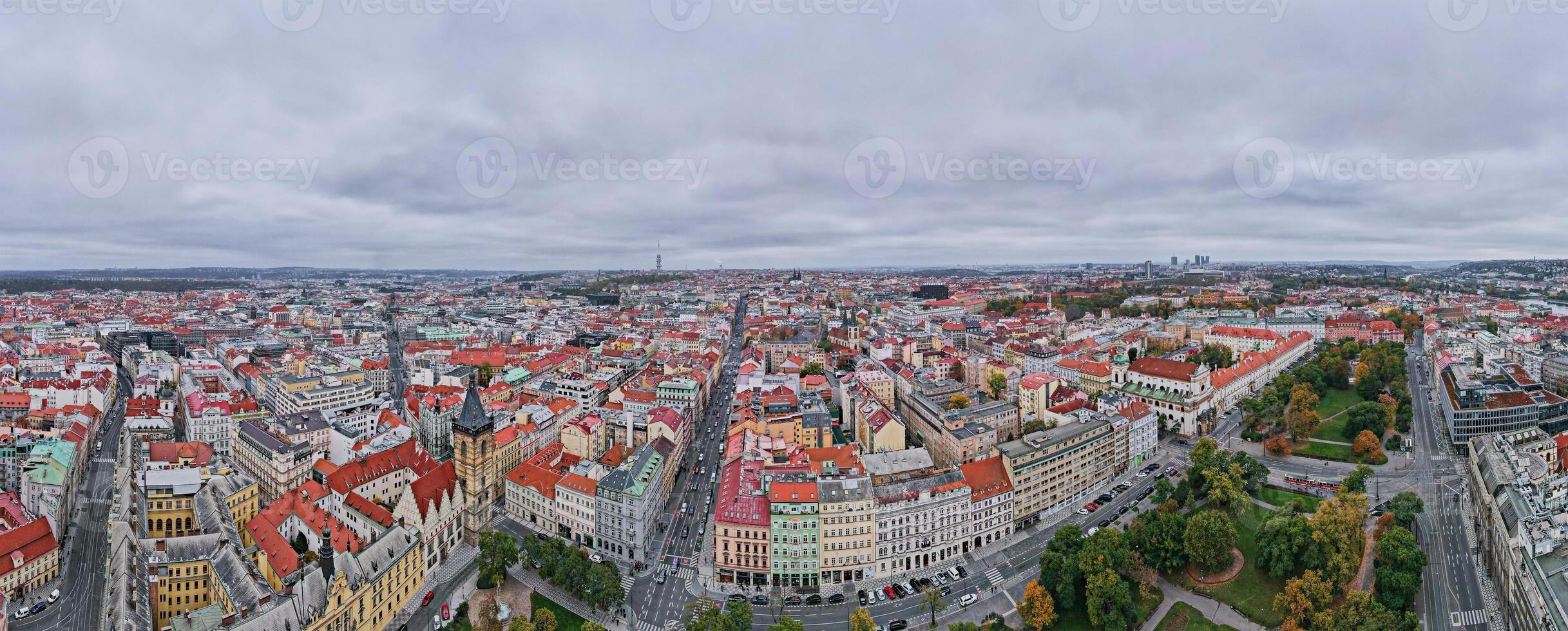 Prague architecture, aerial view. Historical buildings with red roofs in European city. Birds eye view of cityscape of Praha, Czech Republic photo
