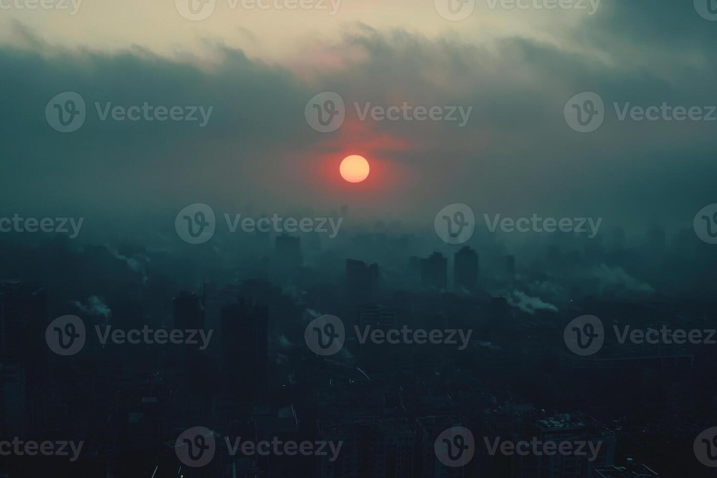 Red Sun Over Foggy City Skyline photo