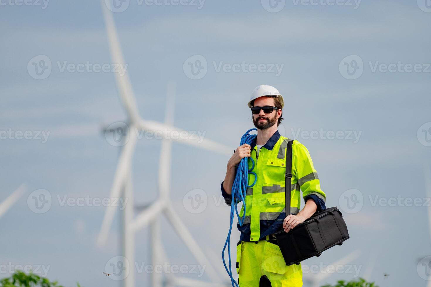 Wind turbine engineers focus on plan review work. in further maintenance. photo