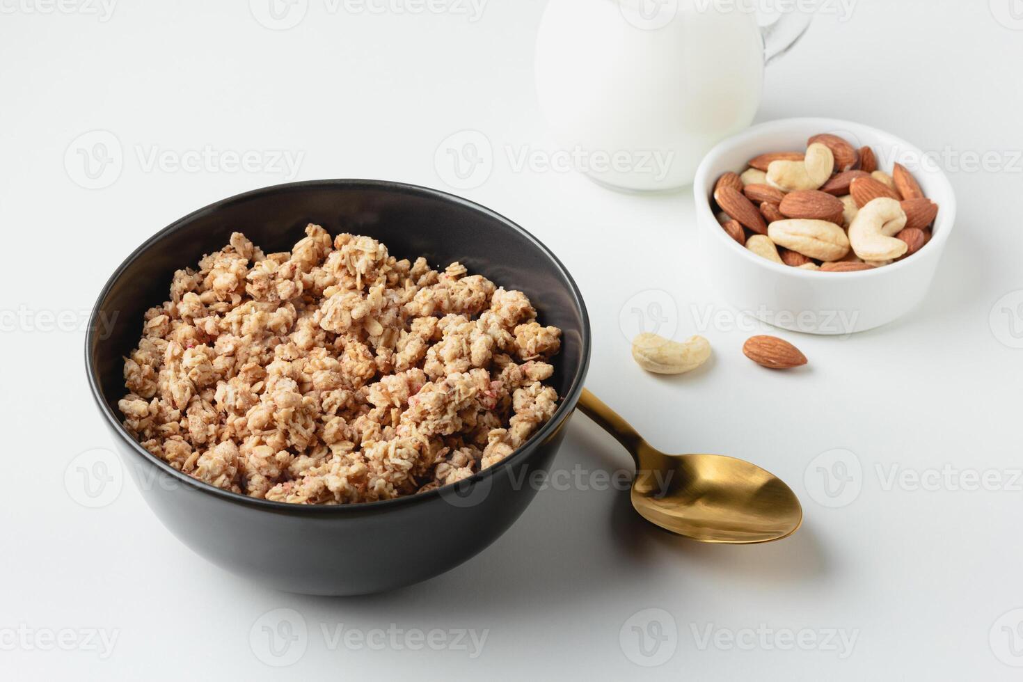 Granola in bowl on light background. photo