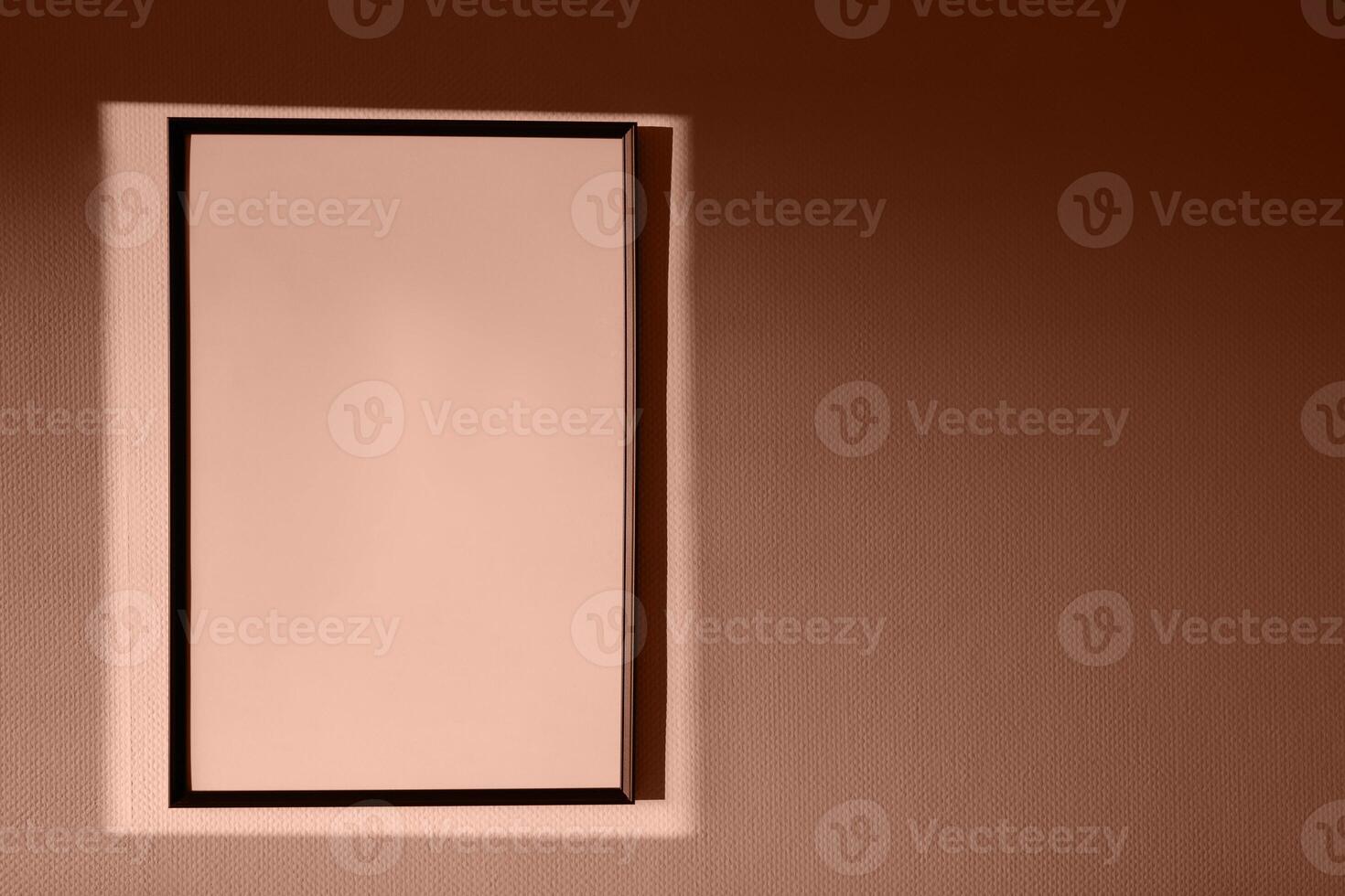 big empty black frame in rectangle of light of setting sun. Apartment design, spf advertisement color of 2025 year photo