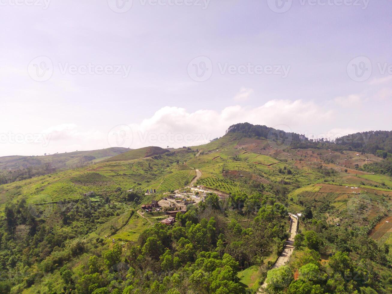 Bird eye View Teletubbies Hill which has been transformed into a tourist area, in Cicalengka, Indonesia. Travel Destination. Public Park. Travel and Tourism photo