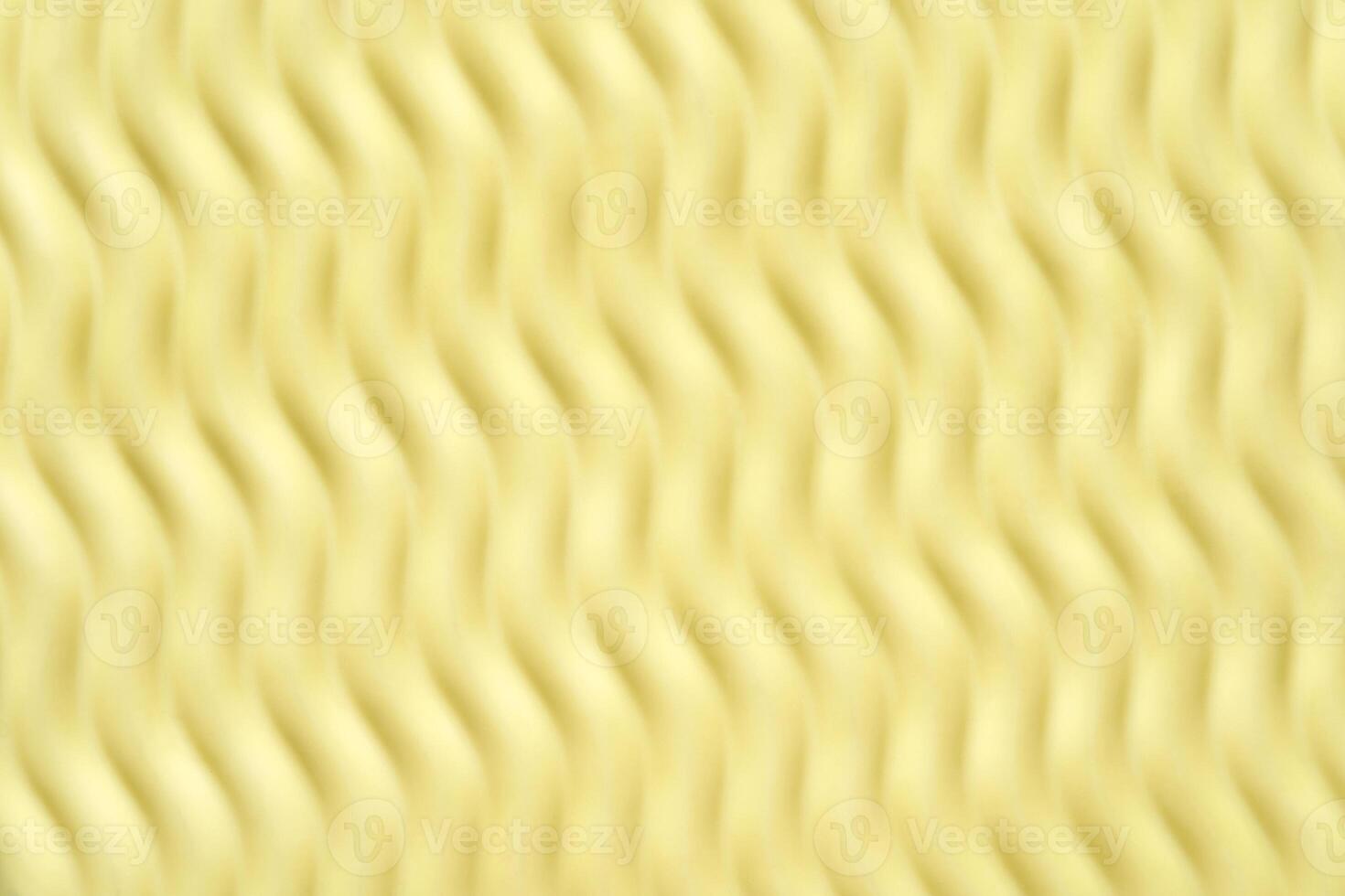 Abstract yellow wavy pattern background with textured surface and repetitive design. photo
