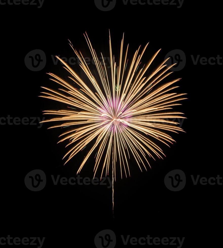 Yellow fireworks on black background photo