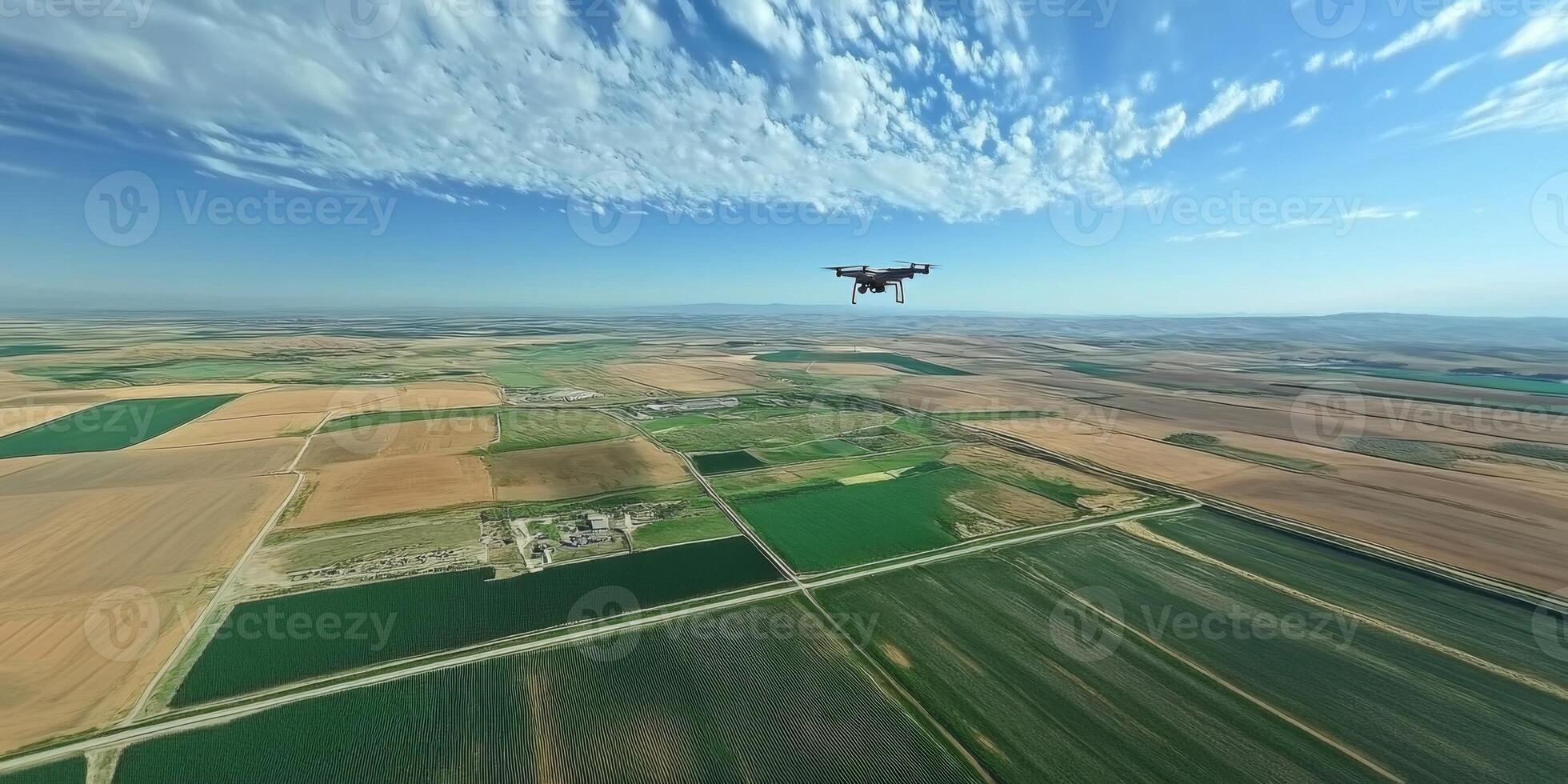 Aerial View of Drone Flying Over Vast Green Agricultural Fields and Farmland Under Clear Blue Sky with White Clouds in Background photo