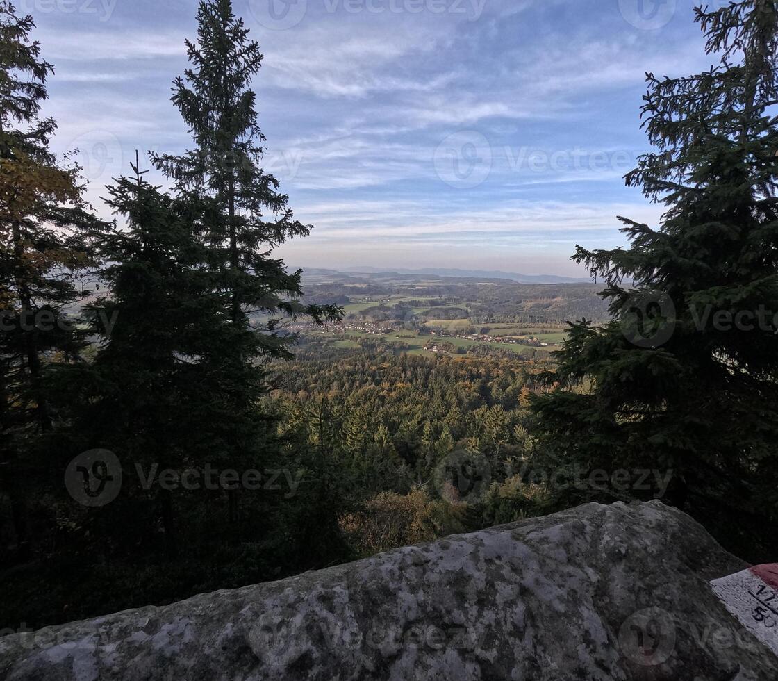 Autumn rainy sky over mountains, autumn mountains from above. Drone view. Poland, Table Mountains. photo
