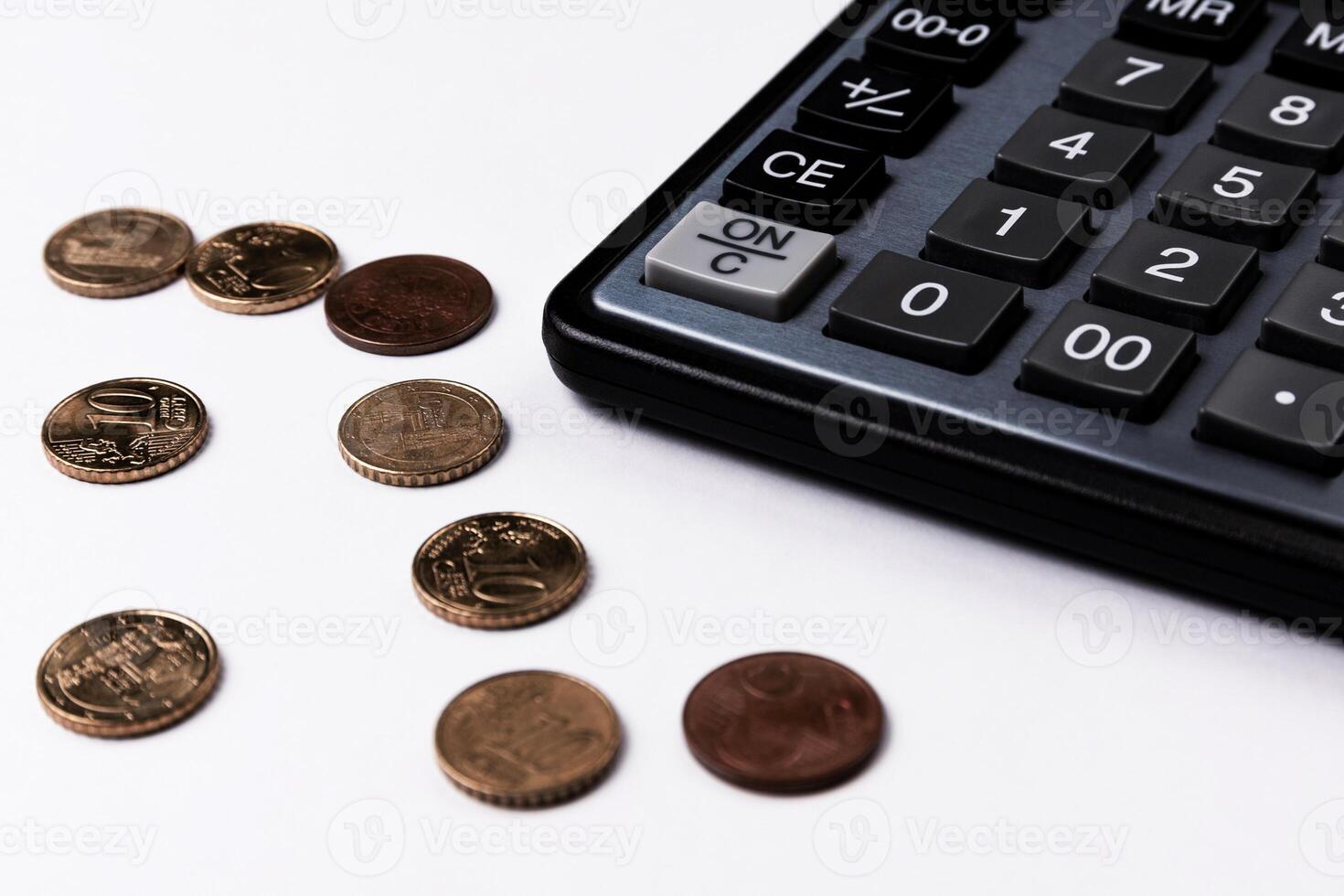 Calculator stands on a business desk in the office. Business background. Copy space photo