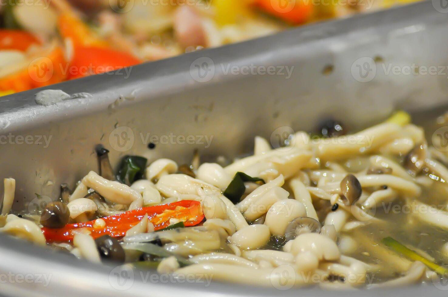 mushroom soup , shimeji mushroom soup or spicy soup or spicy shimeji mushroom soup photo