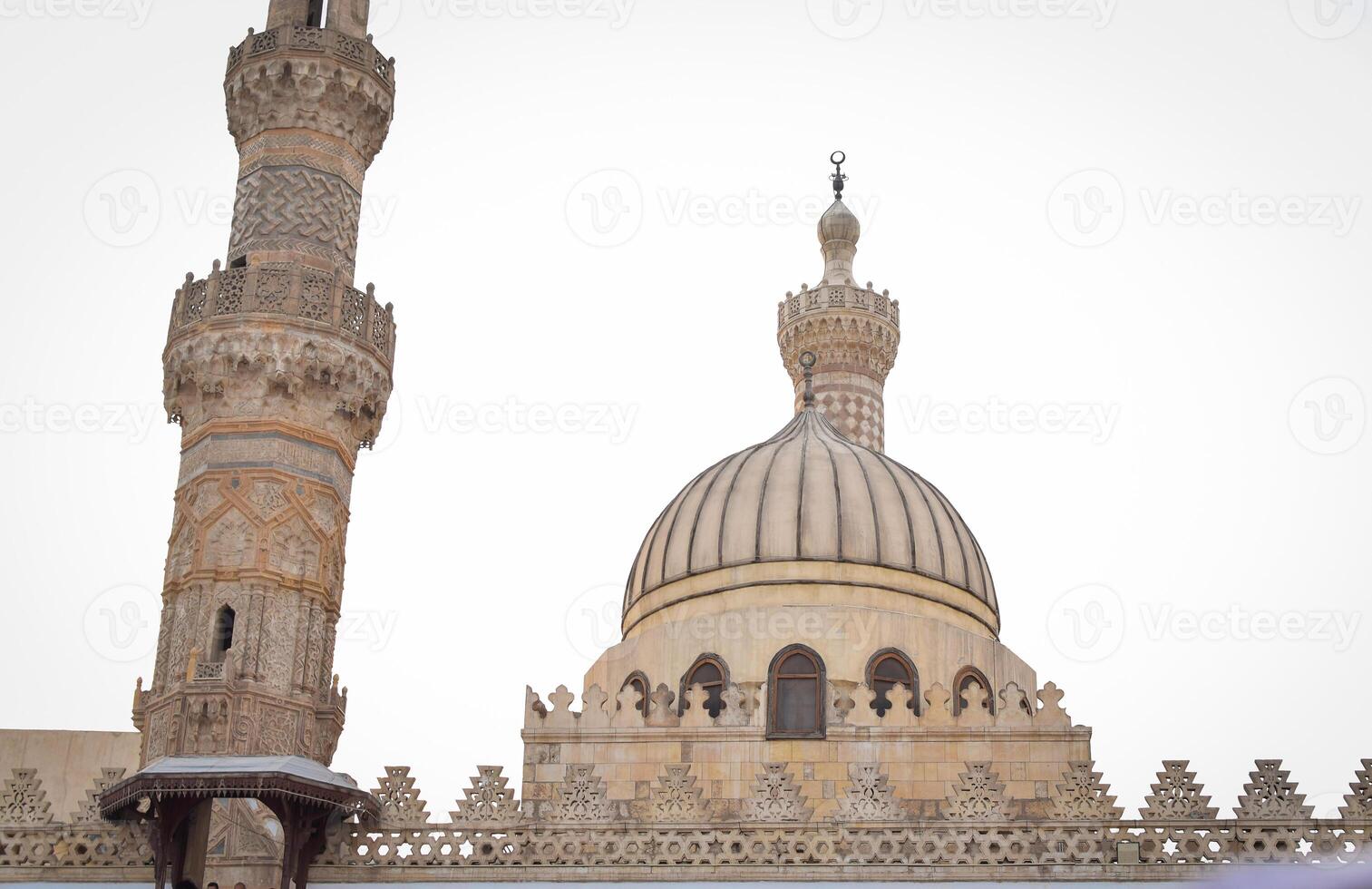 the minaret and dome scene of al-azhar mosque at cairo egypt on sunny day photo