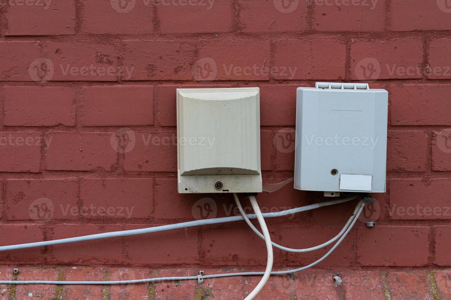 Wall-mounted electrical supply boards installed in urban setting photo