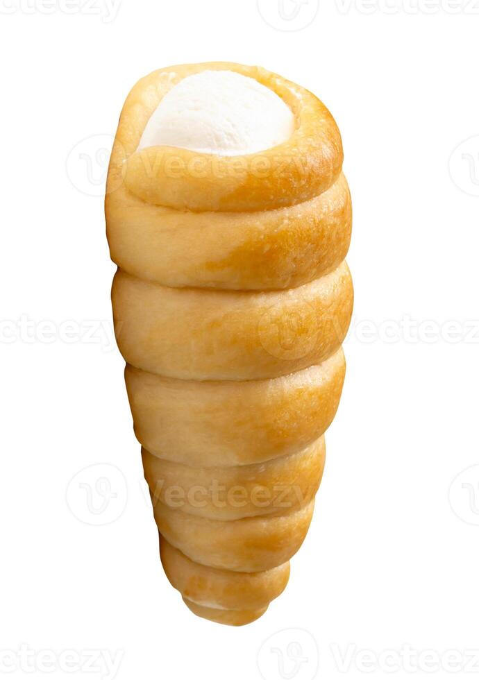 Side view of puff pastry cream horn isolated on white background with clipping path photo