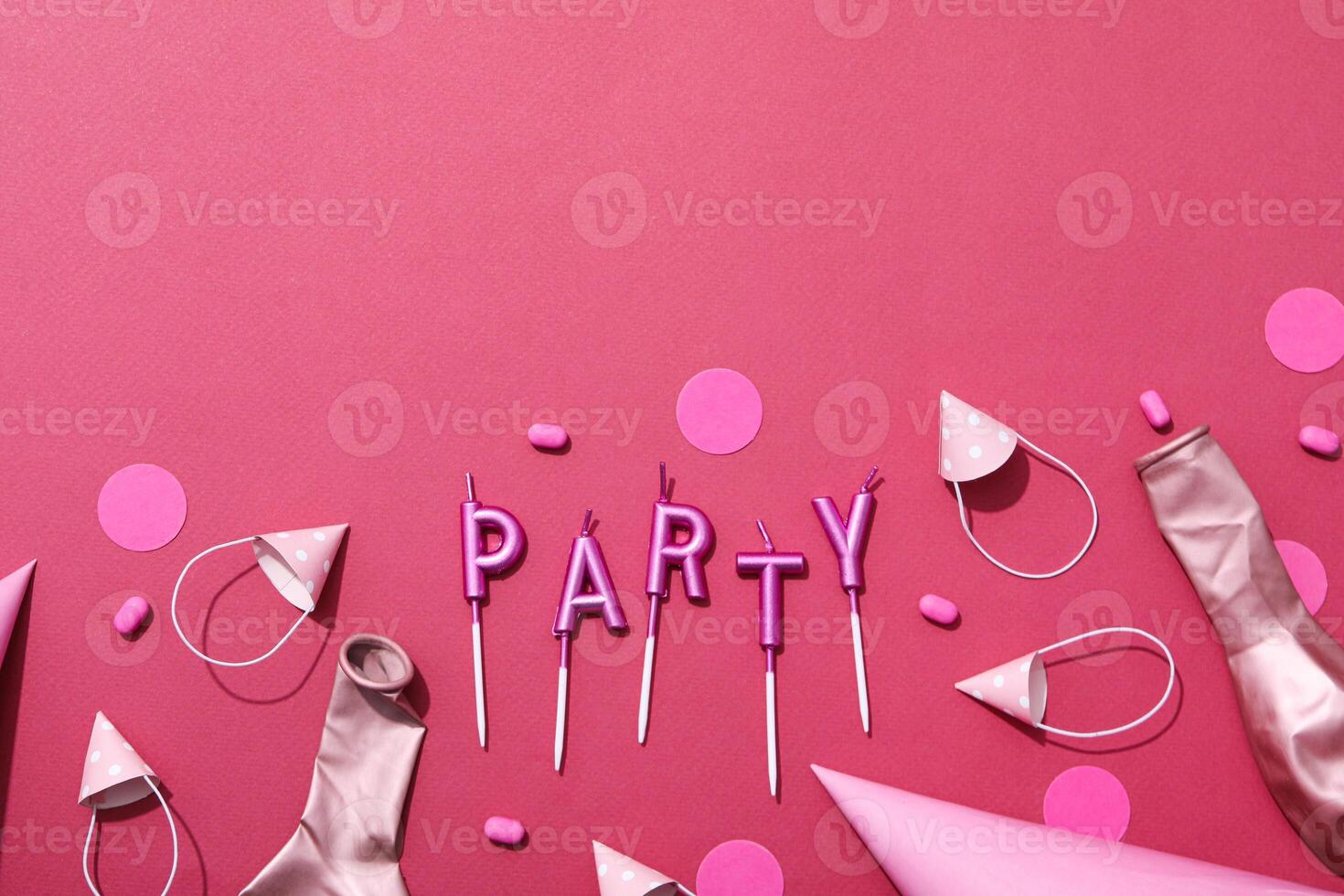 Concept of party decor and confetti, balloons and candles. photo