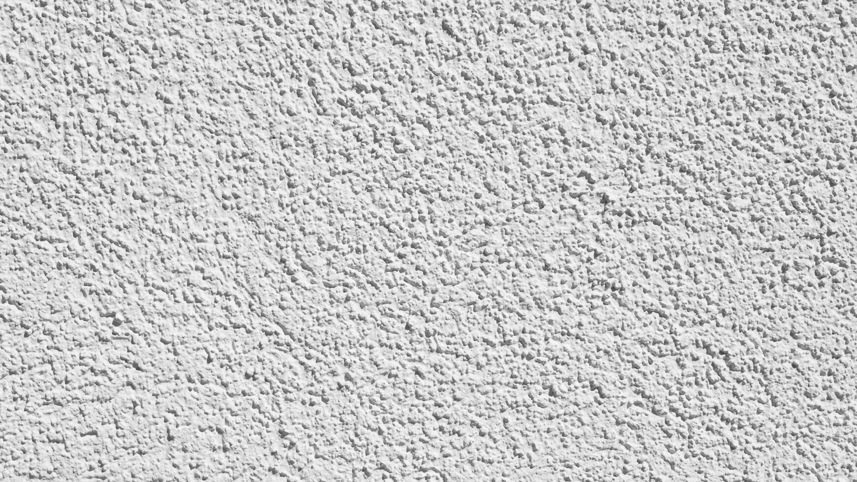 Old cement wall with beautiful pattern in retro concept. Concrete background for wallpaper or graphic design. Blank plaster texture in vintage style. Modern house interiors that feel calm and simple. photo