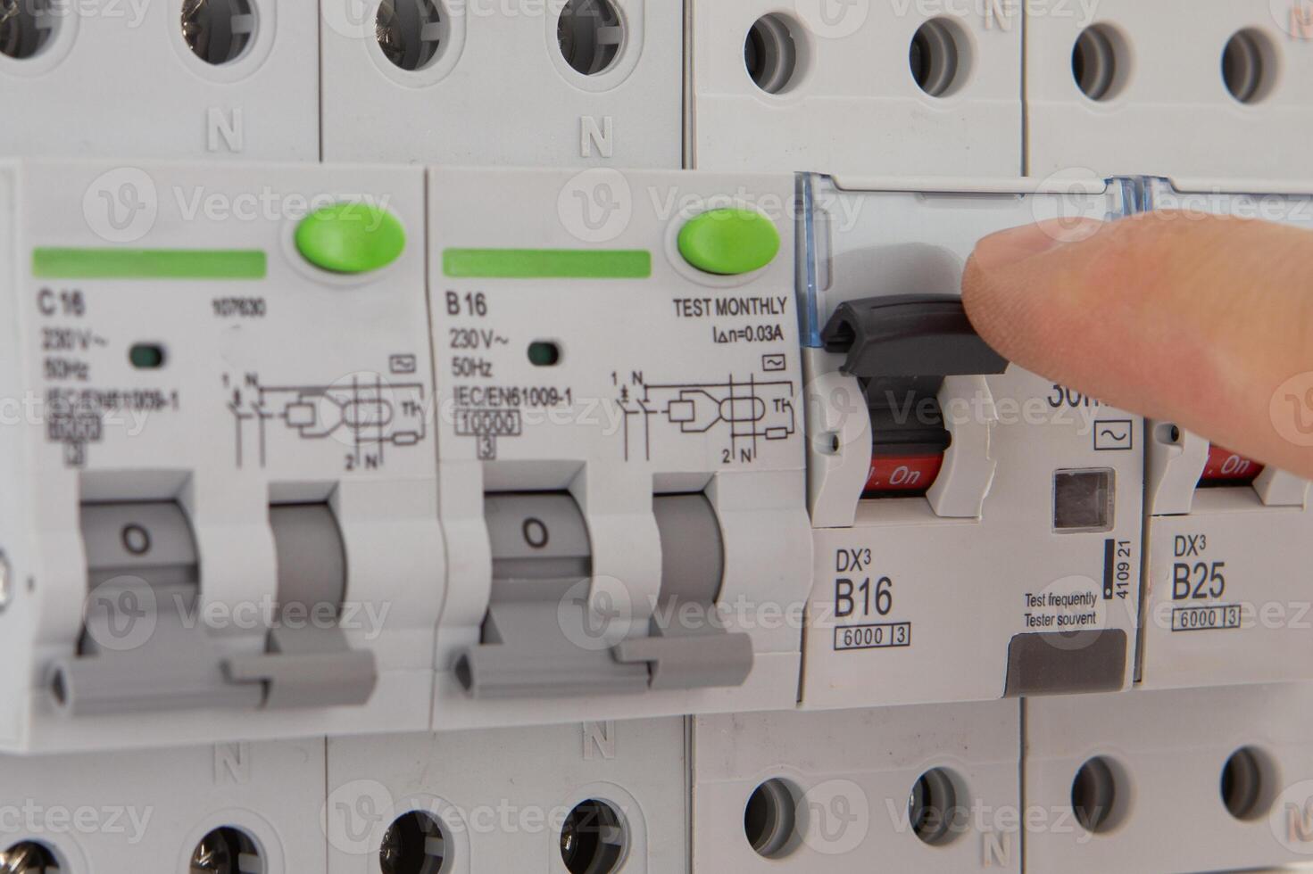 Switching Circuit Breaker in Electrical Panel photo