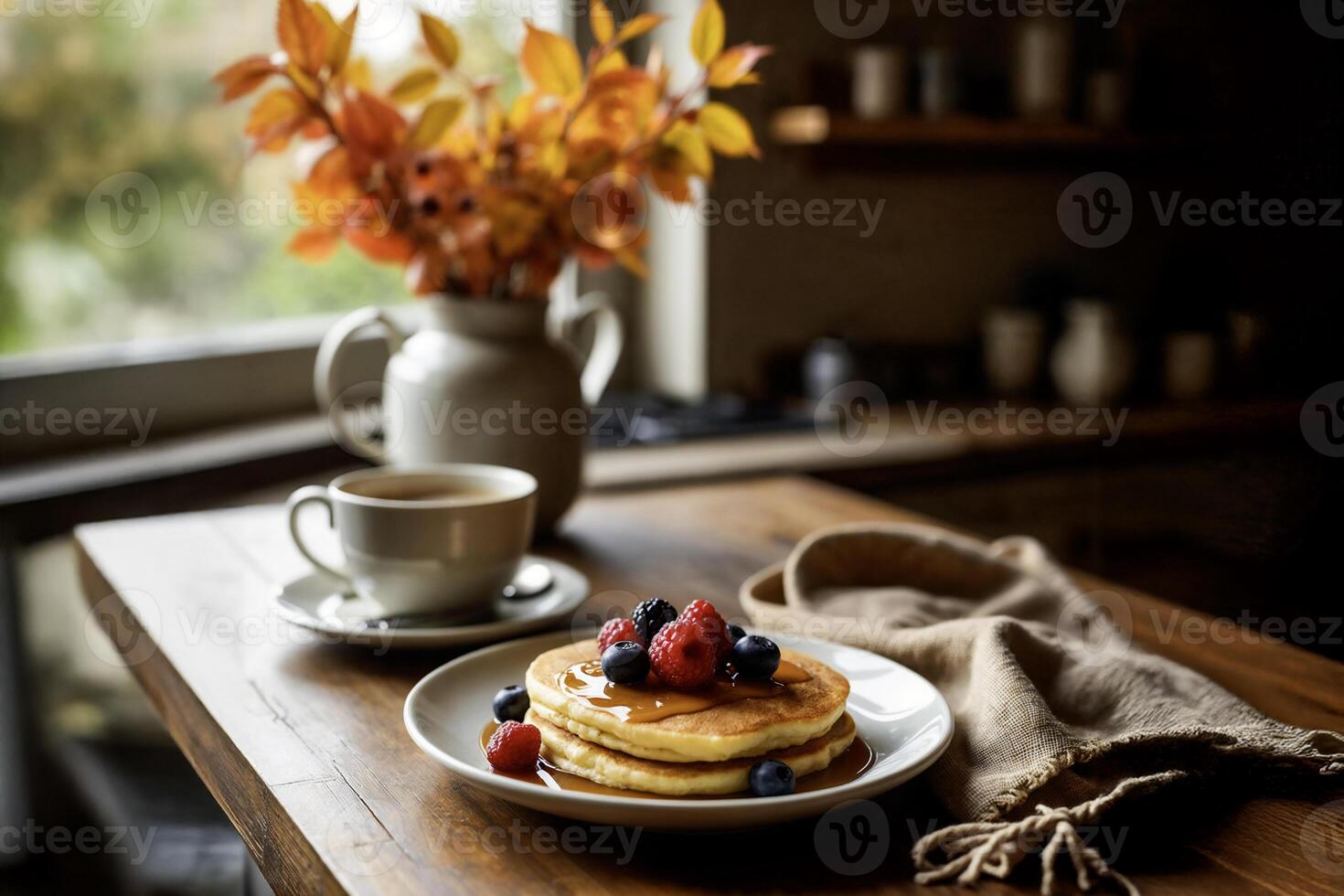 Cozy autumn breakfast with pancakes and fresh berries photo