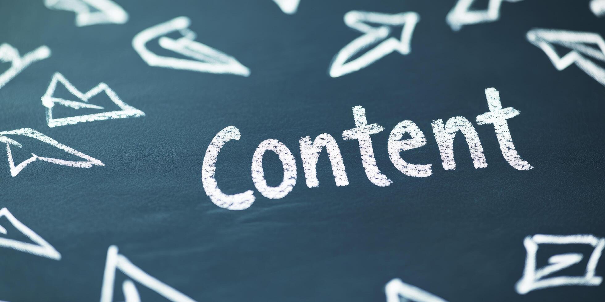 Arrows pointing to the word Content. Blackboard background with white chalk drawing arrows and text. photo