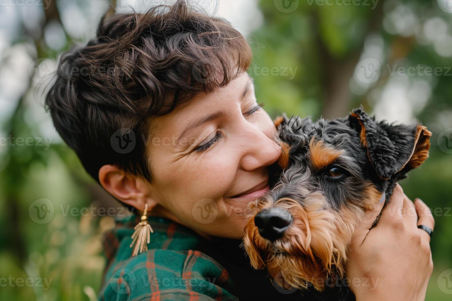 30 years old american brunette wotan with short hair hogging spotted happy airedale terrier. sing tsar daitime photo