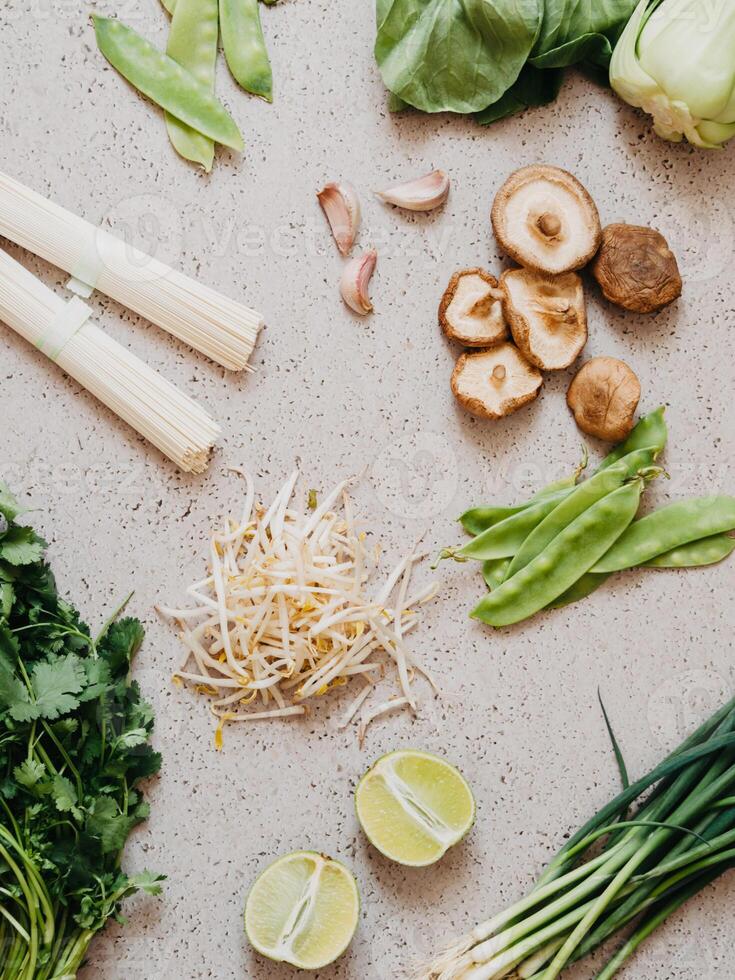 Cooking ingredients for Asian dishes on gray concrete background photo