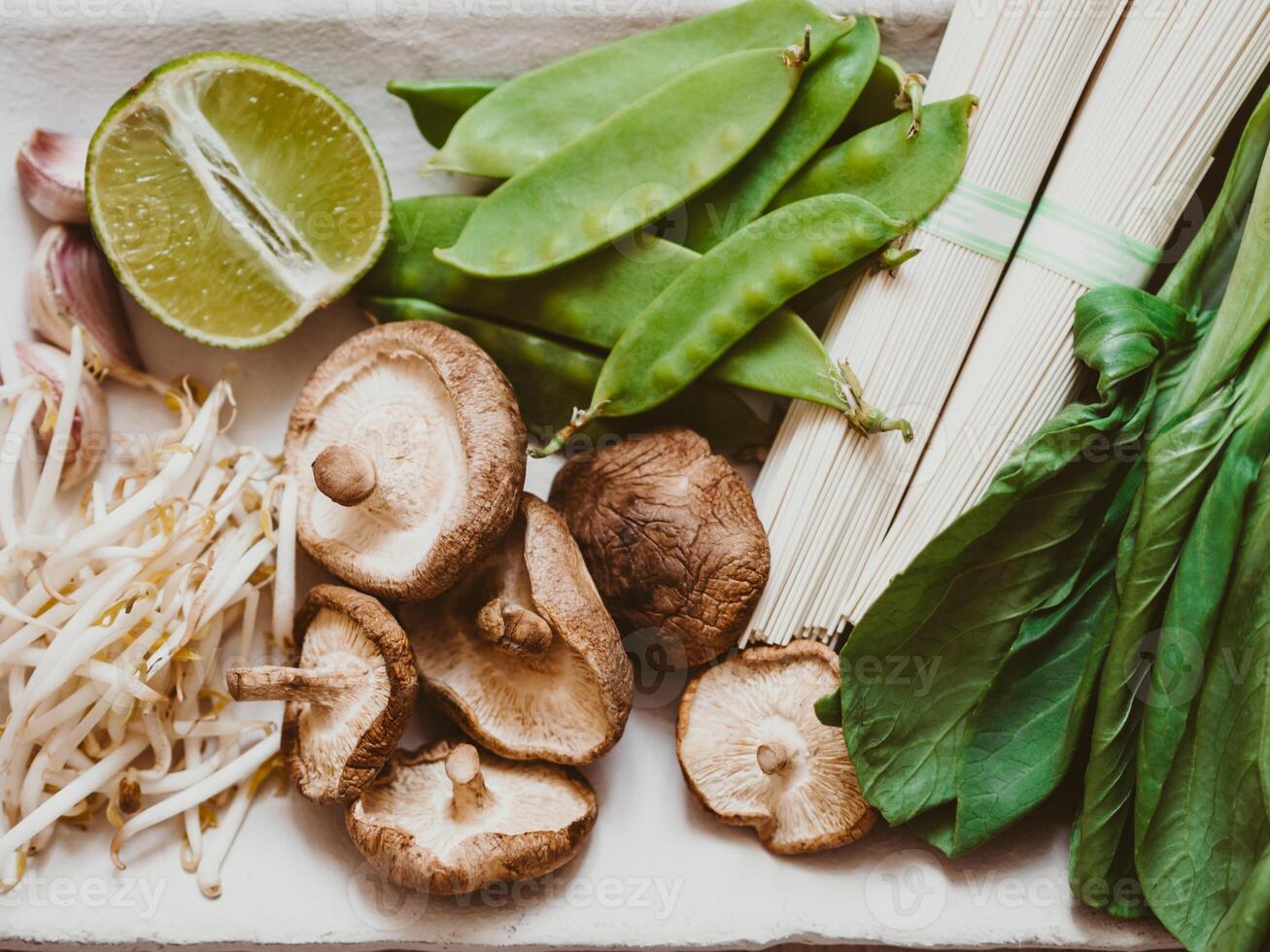 Cooking ingredients for Asian dishes on white plate photo