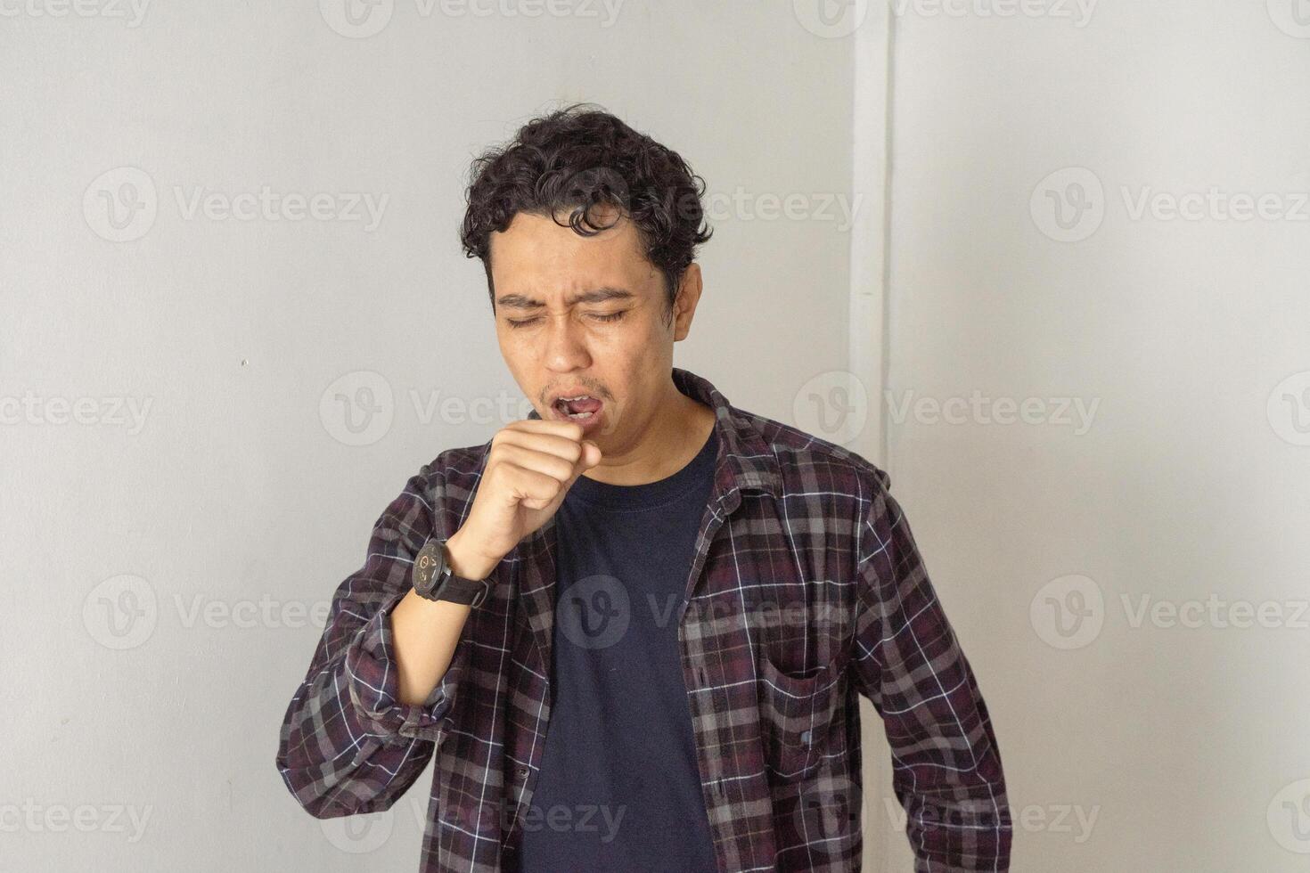 Asian Man Coughing photo